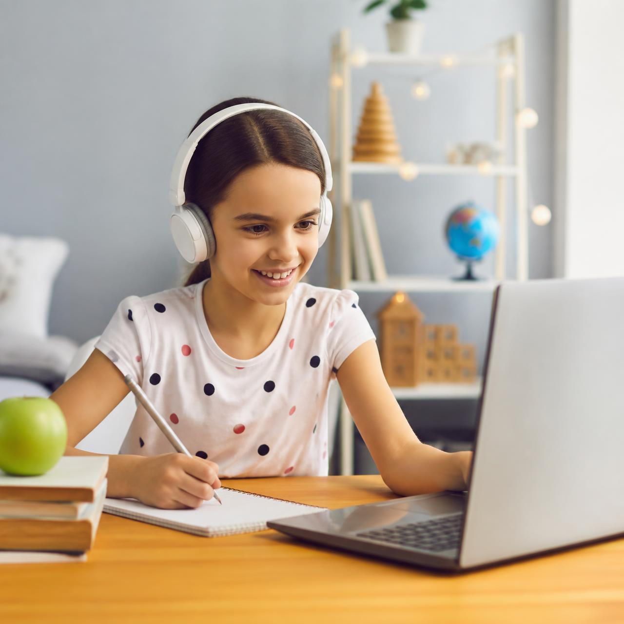A young Primorix Edu student learning live online with a tutor